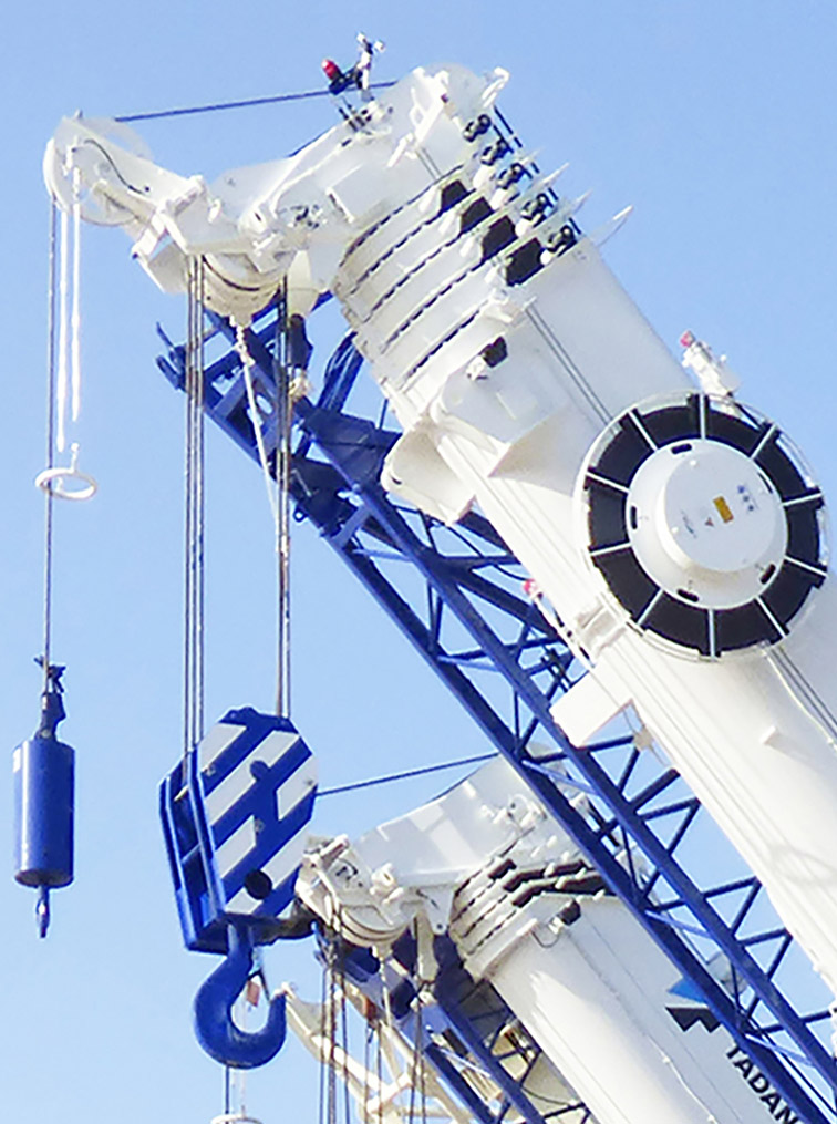 Tadano crane with load block to highlight two-blocking area for crane safety.